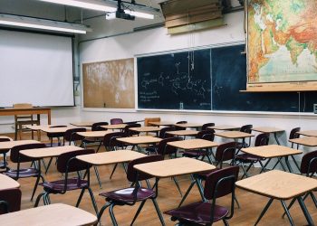 empty classroom with DIY projector screen in front